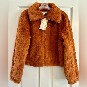 Band Of The Free Val Faux Fur Jacket. Size medium. Color is a burnt orange.